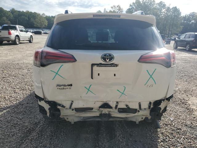 Photo 6 from auction – 2017 TOYOTA RAV4 LE with VIN JTMZFREV2HJ105059