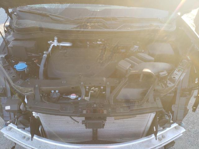 Photo 11 from auction – 2024 HONDA PASSPORT E with VIN 5FNYF8H53RB014554