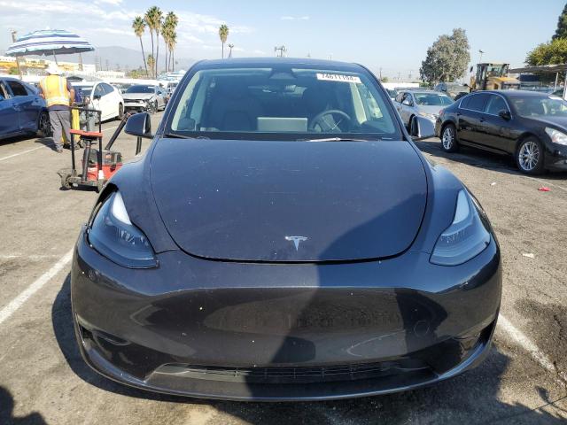 Photo 5 from auction – 2024 TESLA MODEL Y with VIN 7SAYGAEEXRF104778