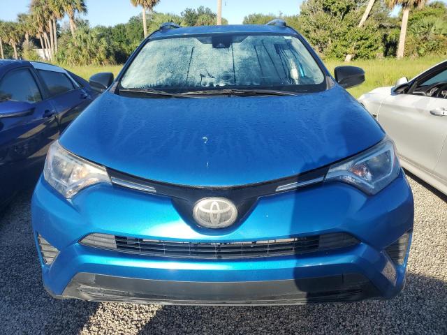 Photo 5 from auction – 2017 TOYOTA RAV4 LE with VIN JTMZFREV8HJ715161
