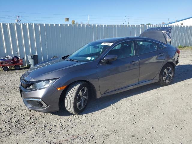 HONDA CIVIC LX 2021 with VIN 2HGFC2F6XMH505877 - Photo from auction