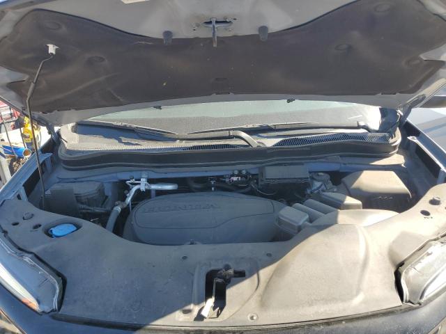 Photo 12 from auction – 2022 HONDA PILOT SE with VIN 5FNYF5H26NB026003