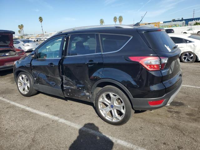 Photo 2 from auction – 2018 FORD ESCAPE TIT with VIN 1FMCU0J95JUD51295