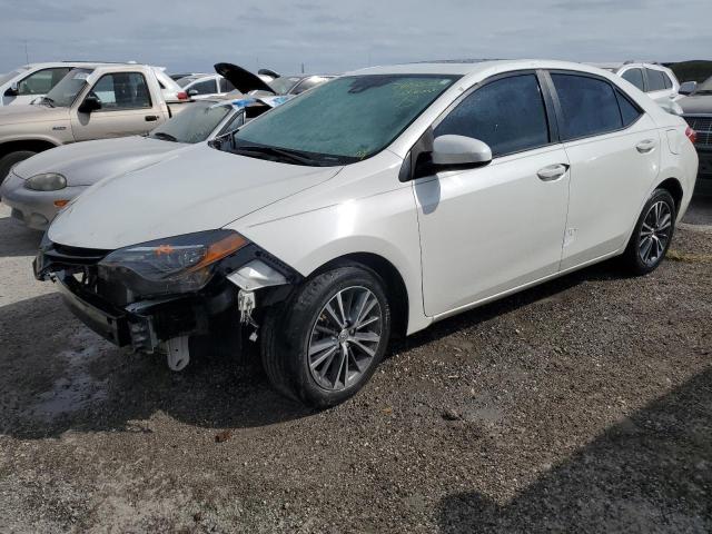 TOYOTA COROLLA L 2018 with VIN 5YFBURHE0JP829000 - Photo from auction