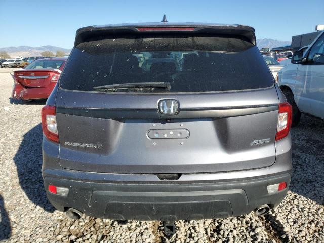 Photo 6 from auction – 2021 HONDA PASSPORT E with VIN 5FNYF8H59MB023980