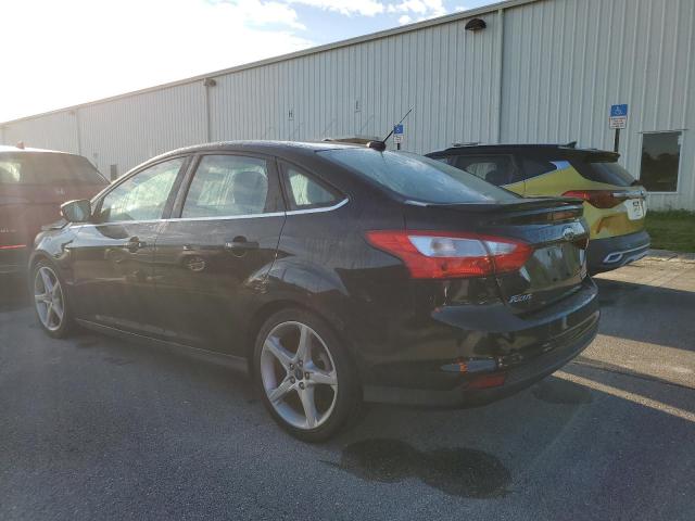 Photo 2 from auction – 2014 FORD FOCUS TITA with VIN 1FADP3J28EL463112