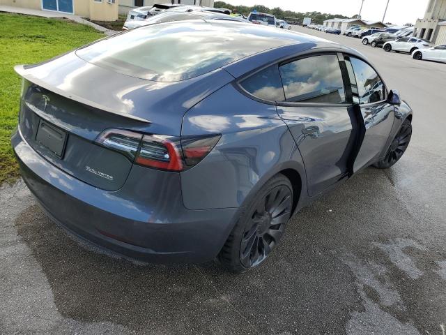Photo 3 from auction – 2022 TESLA MODEL 3 with VIN 5YJ3E1EC7NF318908