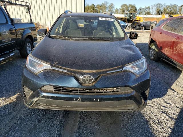 Photo 5 from auction – 2017 TOYOTA RAV4 LE with VIN JTMBFREV0HD205046