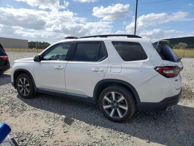 Photo 2 from auction – 2023 HONDA PILOT TOUR with VIN 5FNYG2H76PB013732