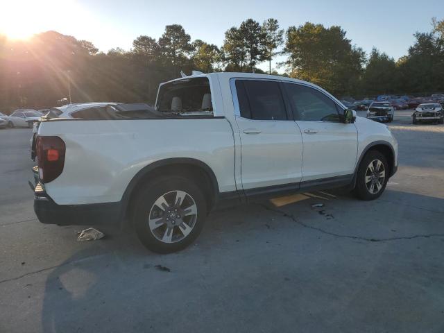 Photo 3 from auction – 2017 HONDA RIDGELINE with VIN 5FPYK2F63HB008764