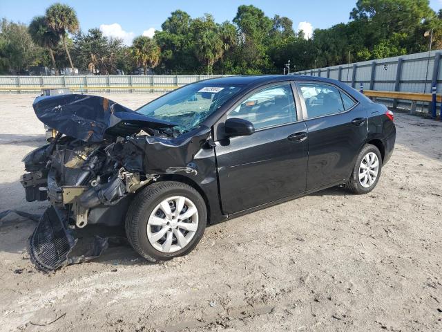 TOYOTA COROLLA L 2015 with VIN 5YFBURHE2FP284540 - Photo from auction