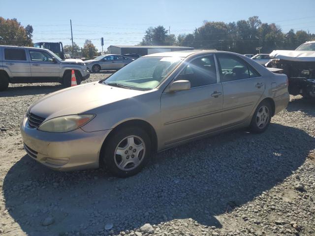 TOYOTA CAMRY LE 2002 with VIN 4T1BF30K12U001305 - Photo from auction