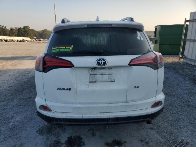 Photo 6 from auction – 2017 TOYOTA RAV4 LE with VIN JTMZFREV5HJ114273
