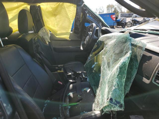 Photo 7 from auction – 2010 FORD ESCAPE LIM with VIN 1FMCU0E73AKA11678