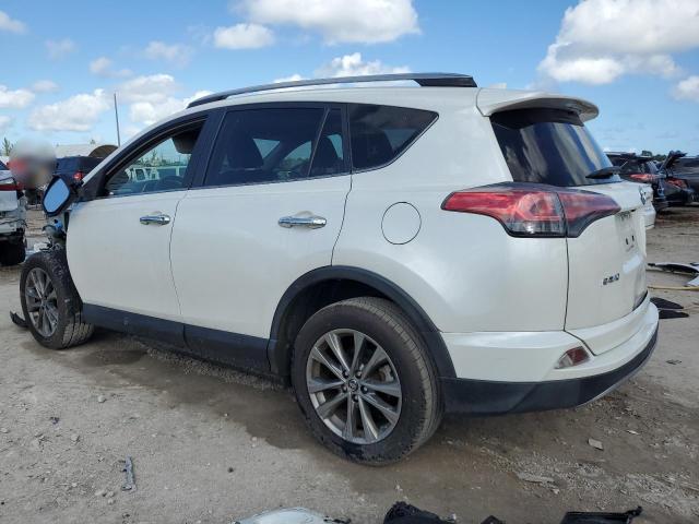 Photo 2 from auction – 2018 TOYOTA RAV4 LIMIT with VIN JTMYFREV1JD111855