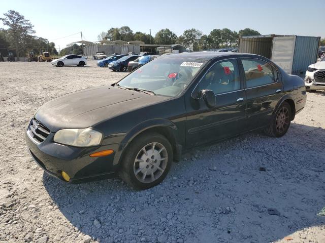 NISSAN MAXIMA GLE 2000 with VIN JN1CA31DXYT763119 - Photo from auction