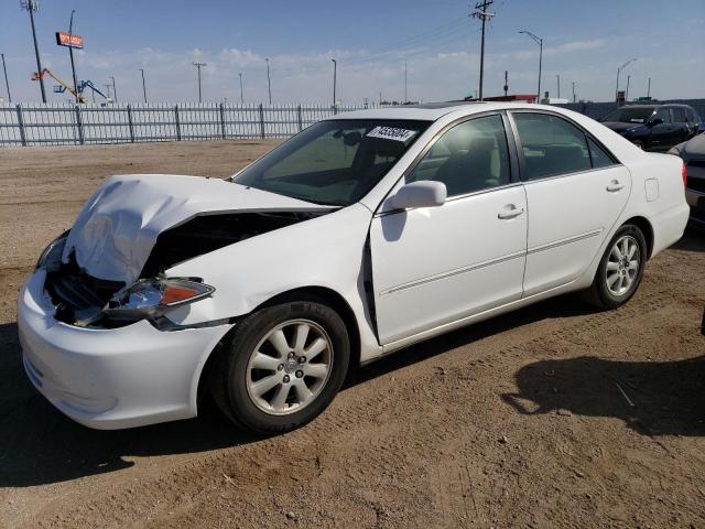 TOYOTA CAMRY LE 2002 with VIN 4T1BE32K82U098146 - Photo from auction
