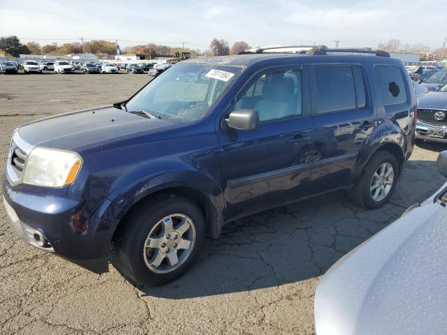 HONDA PILOT LX 2013 with VIN 5FNYF4H21DB024040 - Photo from auction