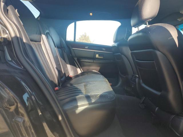 Photo 10 from auction – 2004 LINCOLN TOWN CAR E with VIN 1LNHM81W64Y688534