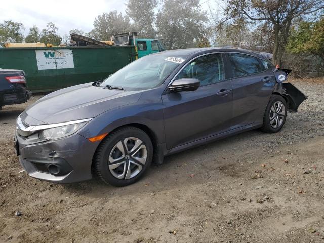 HONDA CIVIC LX 2016 with VIN 19XFC2F65GE059376 - Photo from auction