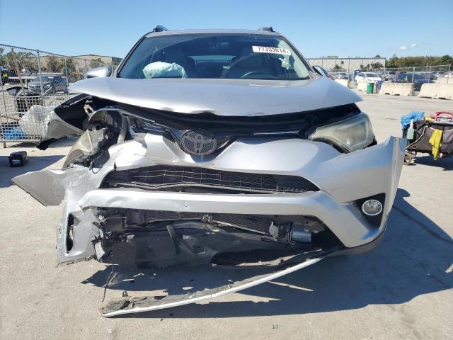 Photo 5 from auction – 2016 TOYOTA RAV4 XLE with VIN 2T3WFREV7GW300304