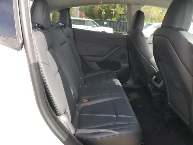 Photo 10 from auction – 2023 TESLA MODEL Y with VIN 7SAYGDEE6PA077249