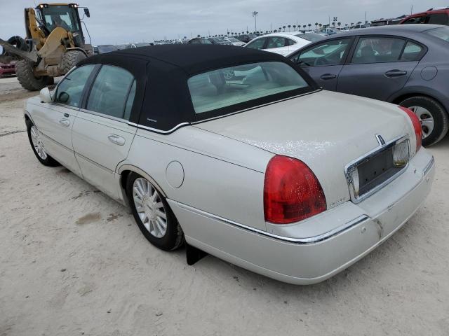 Photo 2 from auction – 2004 LINCOLN TOWN CAR E with VIN 1LNHM81W94Y677804
