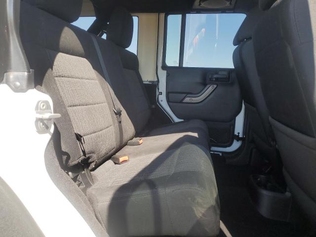 Photo 11 from auction – 2011 JEEP WRANGLER U with VIN 1J4BA3H14BL553038