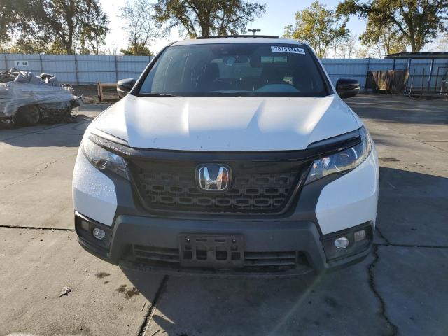 Photo 5 from auction – 2020 HONDA PASSPORT E with VIN 5FNYF7H50LB006431