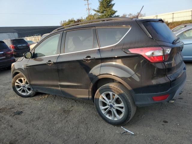 Photo 2 from auction – 2018 FORD ESCAPE SE with VIN 1FMCU9GD9JUA21742
