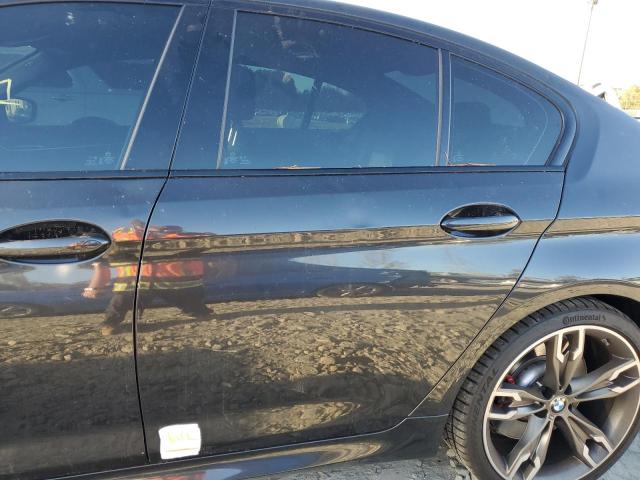 Photo 12 from auction – 2021 BMW M550XI with VIN WBA13BK04MCF56093