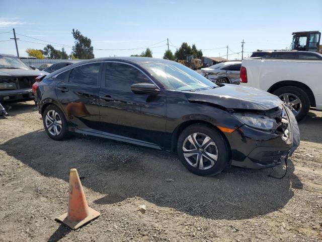 Photo 4 from auction – 2017 HONDA CIVIC LX with VIN 2HGFC2F58HH523744