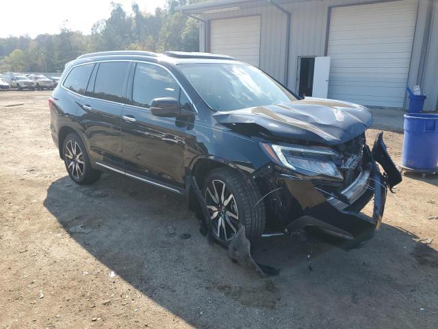 Photo 4 from auction – 2021 HONDA PILOT TOUR with VIN 5FNYF5H65MB013423
