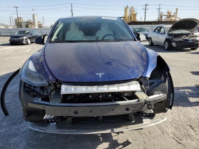 Photo 5 from auction – 2023 TESLA MODEL Y with VIN 7SAYGDED7PF977572