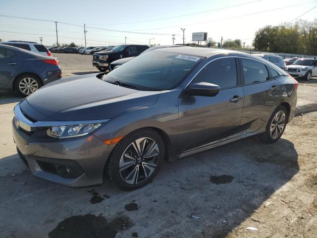 Photo 1 from auction – 2018 HONDA CIVIC EX with VIN JHMFC1F46JX013604