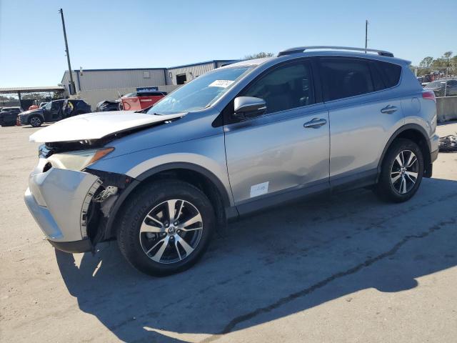 TOYOTA RAV4 XLE 2016 with VIN 2T3WFREV7GW300304 - Photo from auction