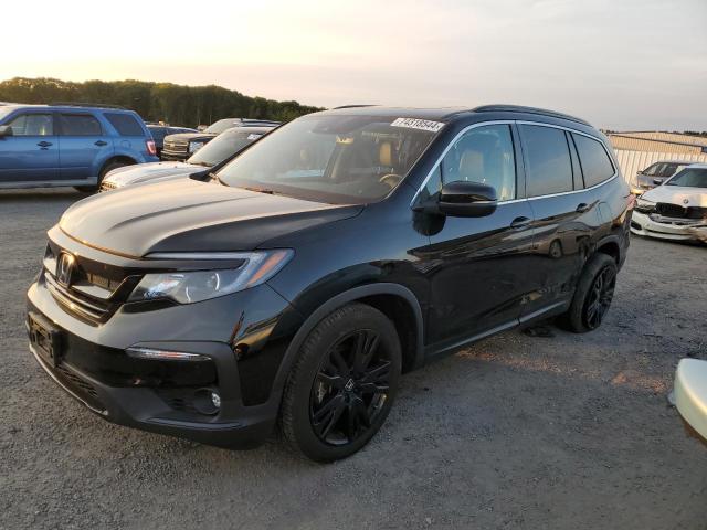 HONDA PILOT SE 2021 with VIN 5FNYF6H26MB063895 - Photo from auction