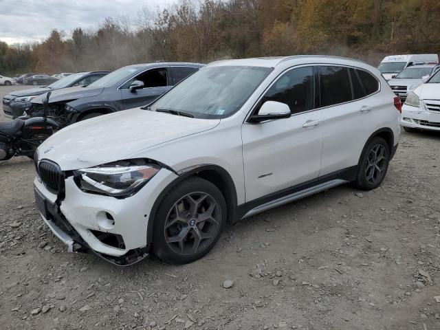 BMW X1 XDRIVE2 2016 with VIN WBXHT3C3XG5F66641 - Photo from auction
