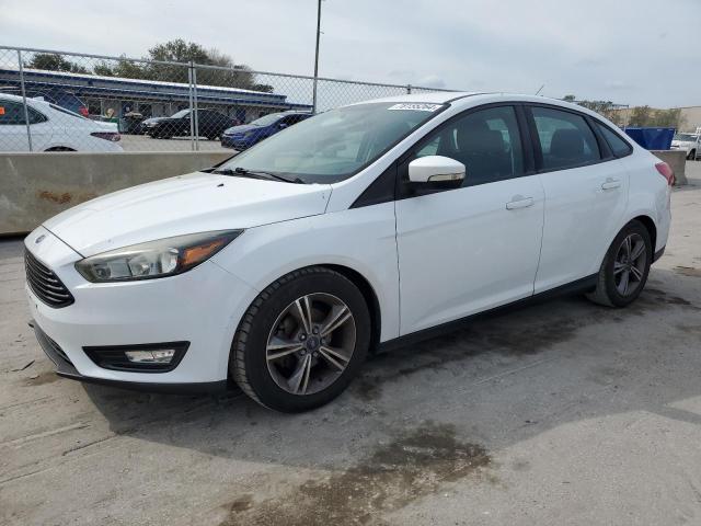 FORD FOCUS SE 2016 with VIN 1FADP3FE6GL371521 - Photo from auction