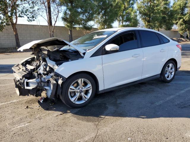 FORD FOCUS SE 2014 with VIN 1FADP3F27EL219265 - Photo from auction