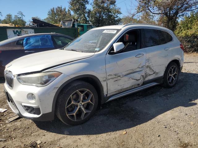 BMW X1 XDRIVE2 2017 with VIN WBXHT3C30H5F75110 - Photo from auction