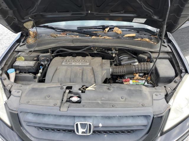 Photo 12 from auction – 2005 HONDA PILOT EXL with VIN 5FNYF18525B029676
