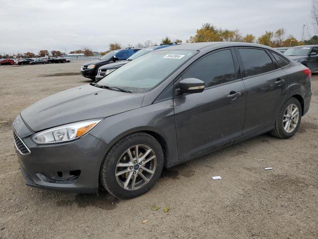 FORD FOCUS SE 2015 with VIN 1FADP3F21FL320836 - Photo from auction
