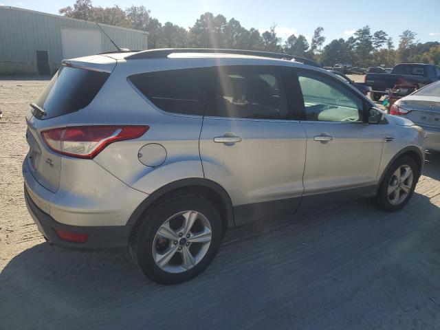 Photo 3 from auction – 2014 FORD ESCAPE SE with VIN 1FMCU9G97EUD84090