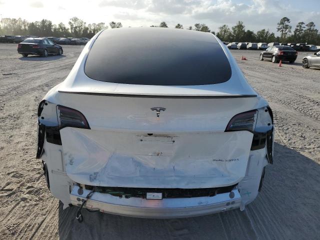 Photo 6 from auction – 2023 TESLA MODEL Y with VIN 7SAYGAEE4PF829614