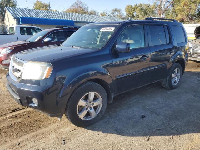 HONDA PILOT EXLN 2011 with VIN 5FNYF4H71BB106584 - Photo from auction