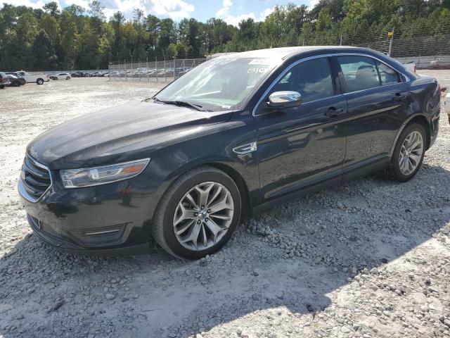 FORD TAURUS 2014 with VIN 1FAHP2F87EG111284 - Photo from auction