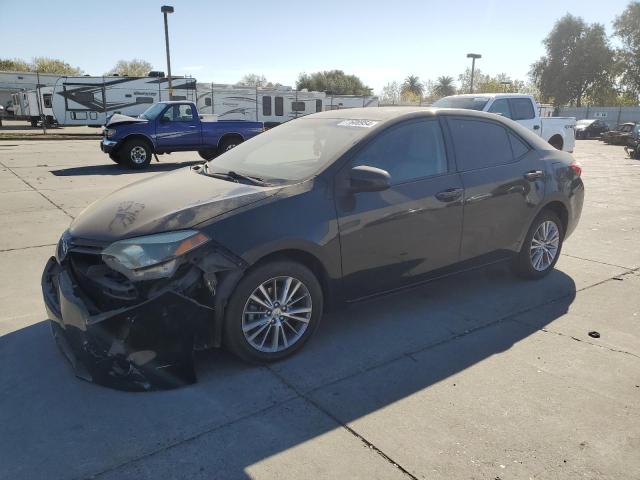 TOYOTA COROLLA L 2015 with VIN 5YFBURHE8FP234290 - Photo from auction