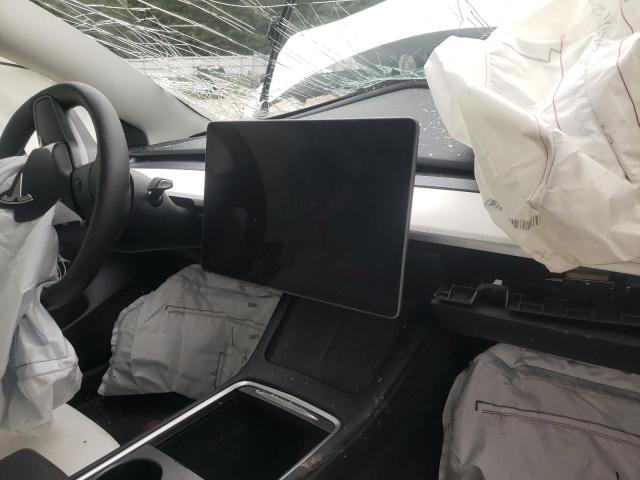 Снимка 9 от търг – 2023 TESLA MODEL 3 с VIN 5YJ3E1EA9PF498300