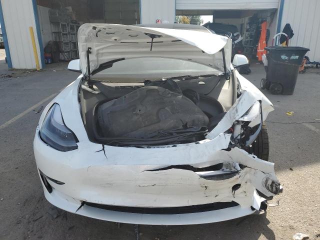 Photo 5 from auction – 2023 TESLA MODEL 3 with VIN 5YJ3E1EC4PF599830